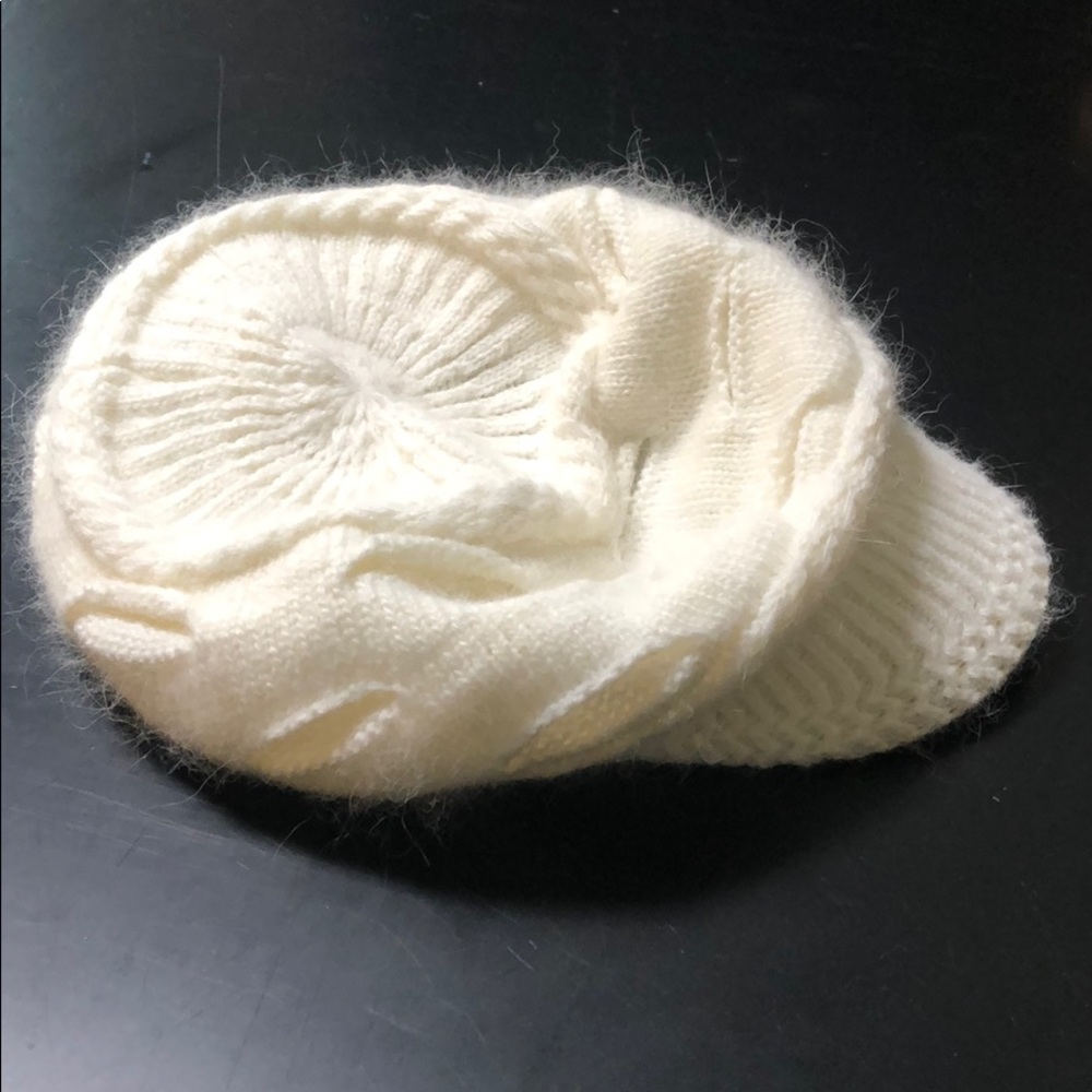 Cream colored knit hat